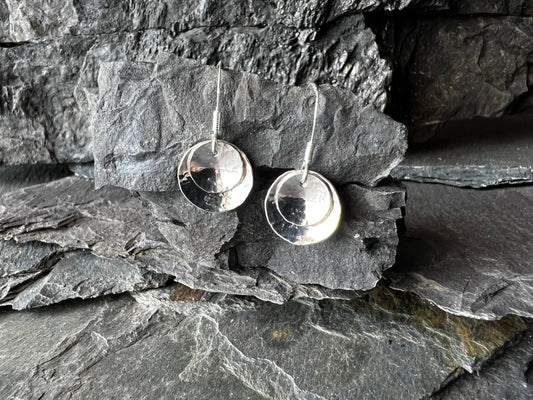 Sterling Silver Double Domed Earrings Displayed on Charcoal Piece - Kerry Gallop Jewellery