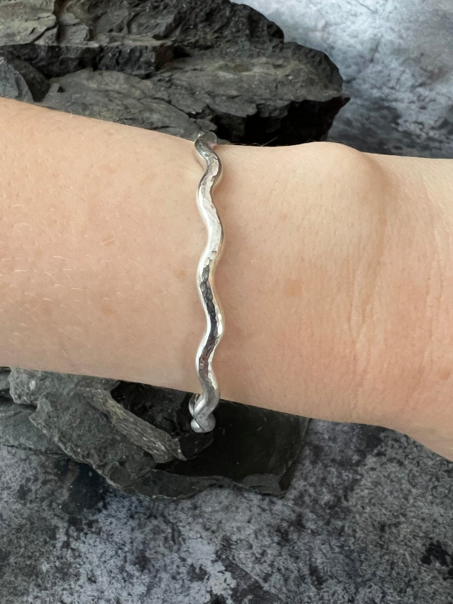 Sterling Silver Textured Wave Bangle (3.5 mm) worn on wrist