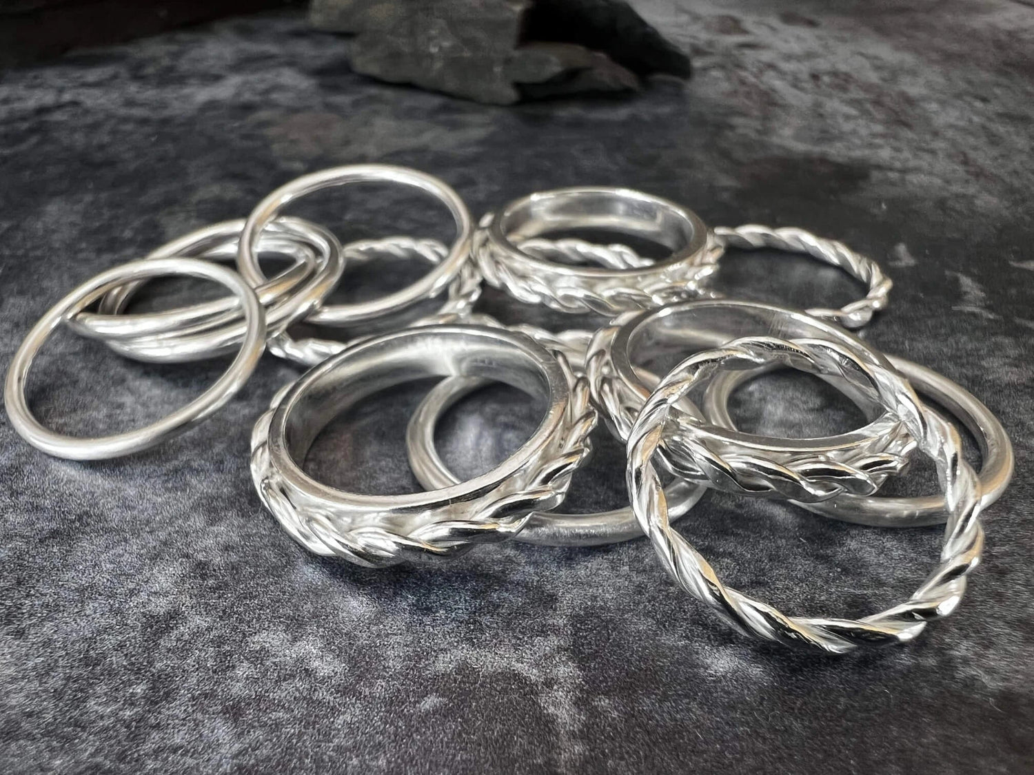 Multiple Rings Displayed on Slate Background - Kerry Gallop Jewellery