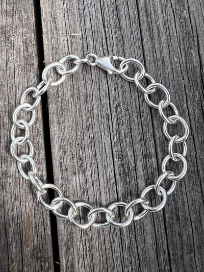 Recycled sterling silver Lina trace chain bracelet on weathered wood, handmade Isle of Wight jewellery