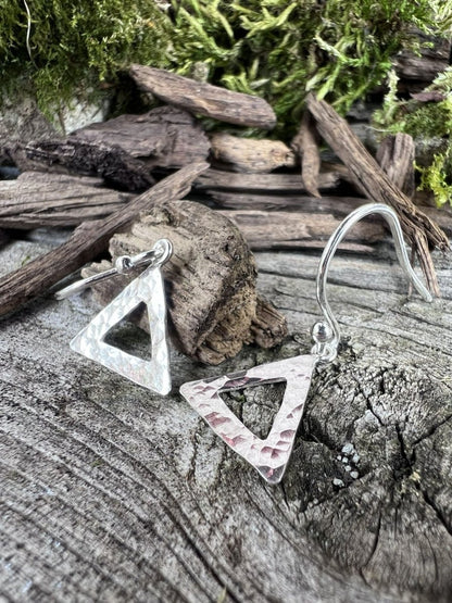 Recycled sterling silver textured triangle drop earrings styled on mossy weathered wood, Isle of Wight handmade jewellery