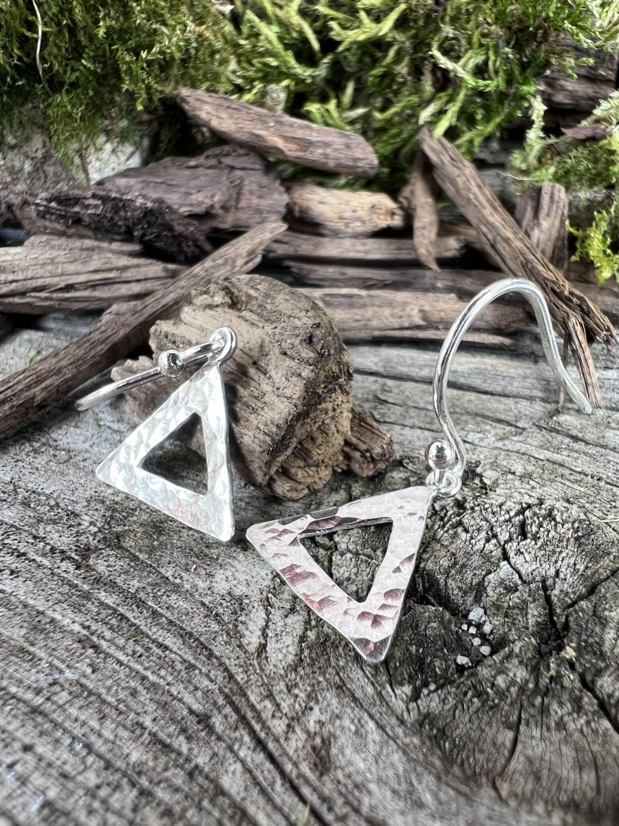Recycled sterling silver textured triangle drop earrings styled on mossy weathered wood, Isle of Wight handmade jewellery